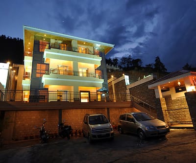 https://imgcld.yatra.com/ytimages/image/upload/t_hotel_yatra_city_desktop/v1480053645/Domestic Hotels/Hotels_Bhimtal/The Tal Paradise/OVERVIEW.jpg